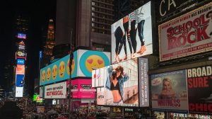 busy road with multiple billboards