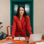 leadership skills business woman wearing red jacket